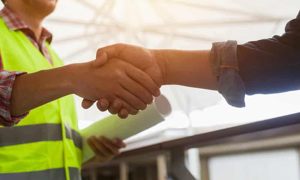 two people shaking hands